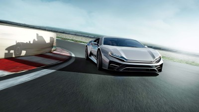 A sports car undergoing a driving dynamics test on a test track
